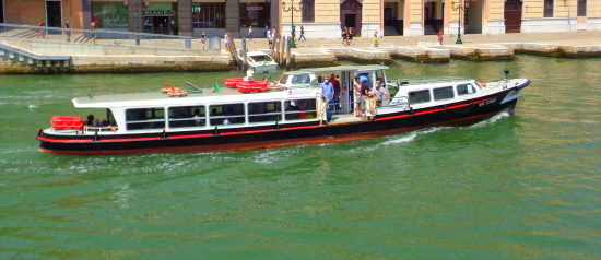 VENICE ITALY VENICE Vaporetto or waterbus carrying tourists and