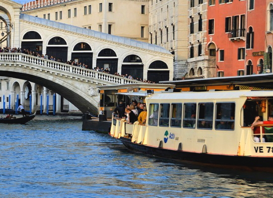 Passengers on board a Route no 2 Vaporetto or water bus on The